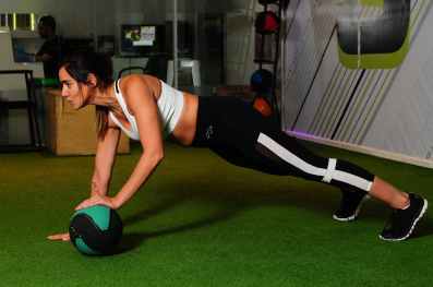 woman doing exercise inside gym